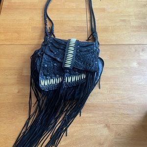 Beautiful bag, worn maybe three times at most. Bought in 2003-2005.